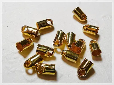 Produktbild von Vintageparts 30 Endkappen goldfarben für 3,5 mm Bänder