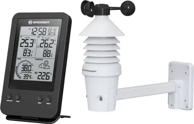 A digital weather station display and a 3-in-1 wind sensor unit are shown against a white background.