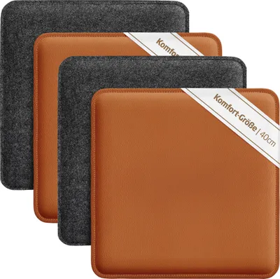 A stack of four reversible seat cushions, two made of gray felt and two of brown faux leather, are displayed on a white background.