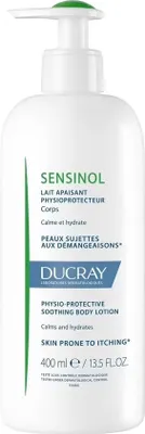 A white bottle of Ducray SENSINOL body lotion with a pump dispenser.