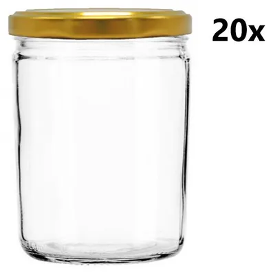 A clear studio shot of a glass jar with a gold lid.