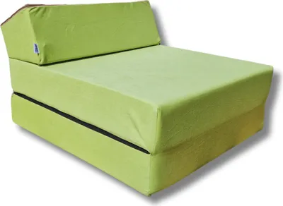 A folded green mattress-chair with a small blue label.