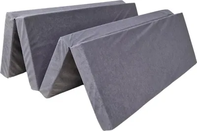 A folded gray mattress.