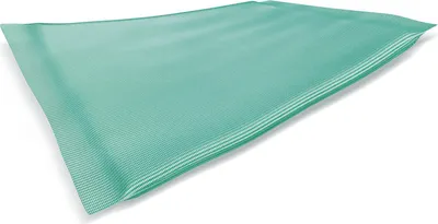 A single teal-colored medical dressing or compress is shown lying flat on a white background, angled slightly.