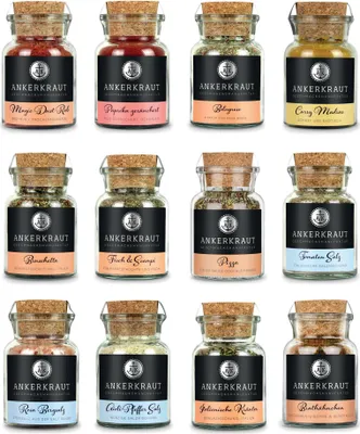 A collage of twelve spice jars with cork stoppers, each labeled with the brand 'ANKERKRAUT'.