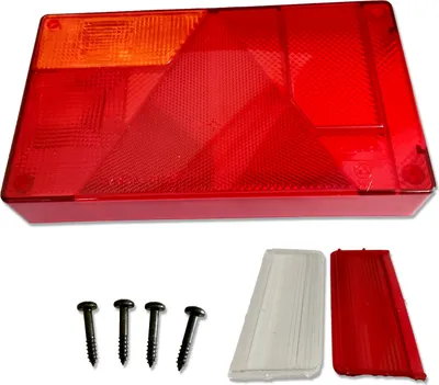 A trailer light assembly and its components are laid out on a white background.
