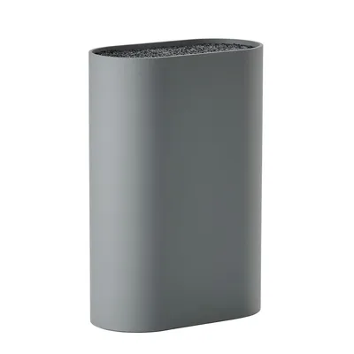 A gray oval knife block is shown against a white background.