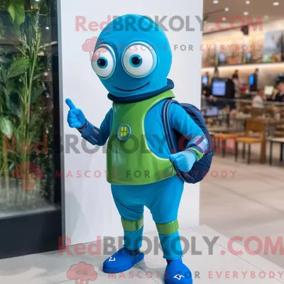 Zdjęcie produktu dla Maskotkarakter REDBROKOLY av en blå cukinia kledd med golf i smartklokker