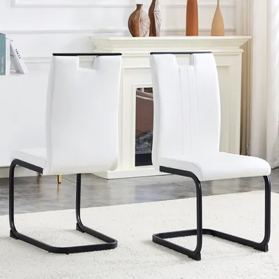 Produktbild von Weiße Esszimmerstühle 2er Set moderne Polsterstühle aus Kunstleder in geschwungener Bogenform ergonomische Küchenstühle für minimalistische Einrichtung