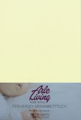 A close-up of a baby's face and shoulder is visible at the bottom of the image, overlaid with product information and branding. The rest of the image is a solid light yellow color.