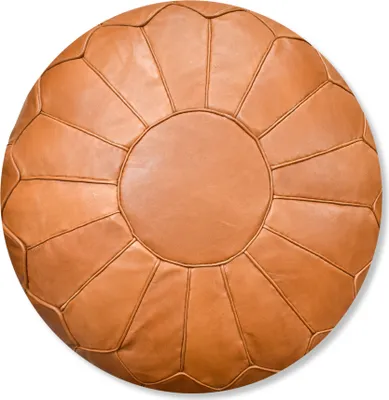 A top-down view of a round, brown leather pouf.