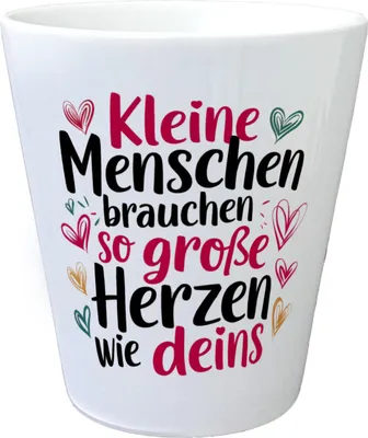 A white ceramic pot with text and heart illustrations.