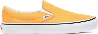 A side view of a single Vans slip-on shoe.