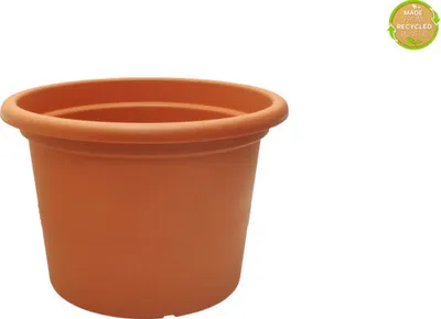 A terracotta colored plant pot on a white background.