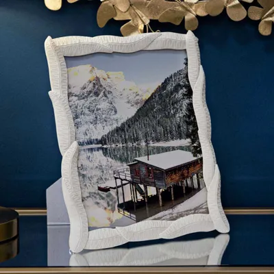 Immagine prodotto di Cornice per foto con motivo a foglie, in resina, 20x25 cm, color crema, design "Serpente" di Mauro Ferretti