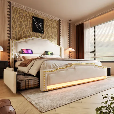 A bedroom scene featuring a large upholstered bed with integrated LED lighting and storage drawers.