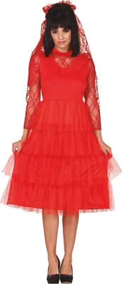 A woman wearing a red dress and veil.