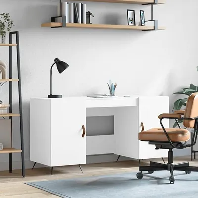 Imagen del producto de Escritorio blanco de tablero de partículas, con dimensiones de 140x50x75 cm, que incluye espacio de almacenamiento y estantería. Mesa de ordenador para oficina, teletrabajo o estudio, con cajón y superficie de apoyo para portátil