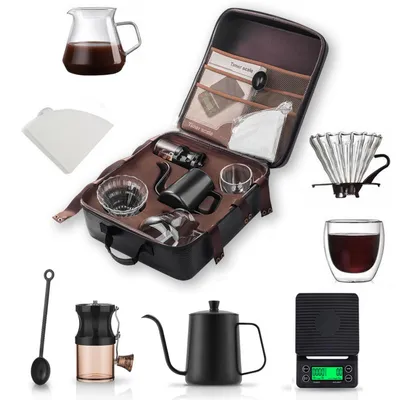 A collection of coffee brewing equipment laid out, including a travel case.