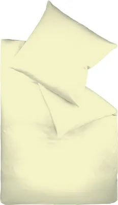 A flat lay of a duvet cover and pillowcase, folded and arranged on a white background.