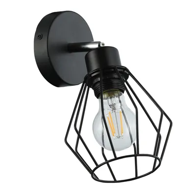 A black metal wall lamp with a geometric cage design and an Edison-style LED bulb.