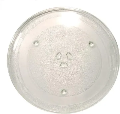 A clear glass turntable plate for a microwave.