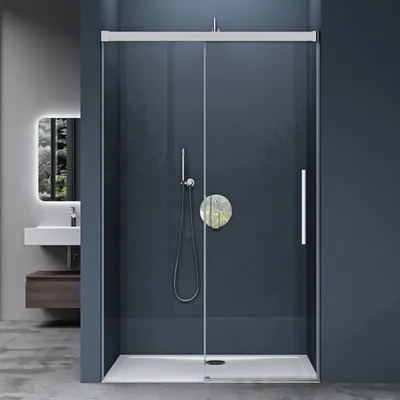 A modern bathroom with a shower enclosure, sink, and vanity.