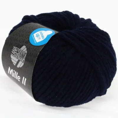 A ball of dark blue yarn with a label wrapped around it.