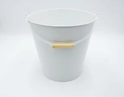A white metal bucket with a wooden handle is shown against a white background.