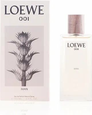 A perfume bottle and its packaging are displayed side-by-side against a white background.