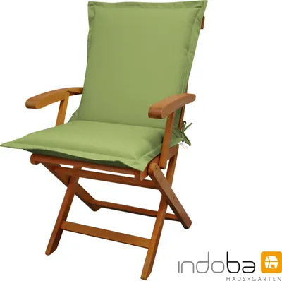 A green cushion on a wooden chair, isolated on a white background.