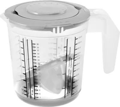 A clear, well-lit studio shot of a measuring jug with measurement markings.