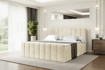 A bedroom scene with a bed as the main focus.