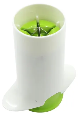 A close-up, studio shot of a green and white vegetable/fruit slicer.