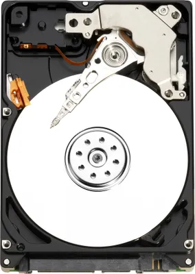 An open hard disk drive showing the internal components.