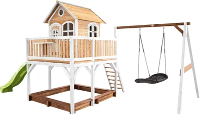 Produktbild von AXI Spielhaus Liam mit Sandkasten, Nestschaukel & hellgrüner Rutsche | Stelzenhaus XXL in Braun & Weiß aus  Holz für Kinder | Spielturm mit Wellenrutsche & Schaukel für den Garten