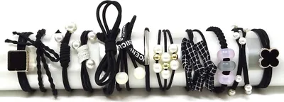 Immagine prodotto di Gommini Piper Neri - Set da 12 per Capelli KP24167
