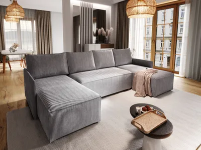A modern living room with a large sectional sofa, coffee table, and dining area visible in the background.