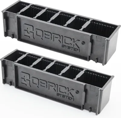 Two black plastic tool holders with multiple compartments, each featuring the 'QBRICK SYSTEM' logo.