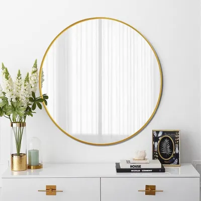 Imagen del producto de Espejo redondo para baño, con un diámetro de 70 cm, marco dorado