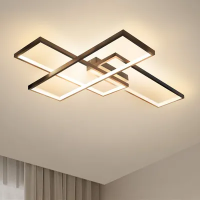 A modern geometric LED ceiling light fixture with multiple rectangular frames, illuminated and mounted on a white ceiling.
