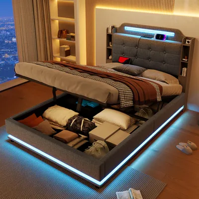 A modern bedroom with a hydraulic storage bed, showcasing its open storage compartment filled with items and illuminated by LED lights.