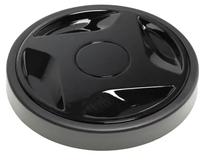A close-up, top-down view of a black vacuum cleaner part.