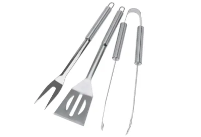 A set of three stainless steel barbecue tools, including a fork, spatula, and tongs, arranged diagonally on a white background.