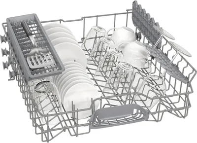 The interior of a dishwasher rack filled with clean dishes and glasses.