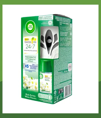 A product box for an Air Wick Freshmatic automatic spray air freshener, showing the device and a spray can.