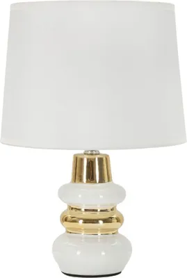 A white and gold table lamp with a white lampshade.