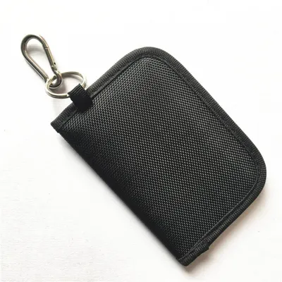 Immagine prodotto di INF Custodia portachiavi schermante RFID - Tessuto Oxford nero, 100% blocco segnale, resistente all'acqua, moschettone e tasca monete