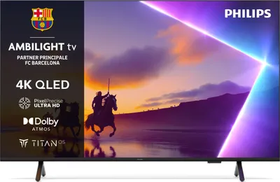 A Philips Ambilight TV with a scene displayed on the screen, featuring text overlays highlighting product features and partnerships.