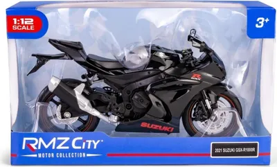 A toy model of a black Suzuki GSX-R1000R motorcycle in its retail packaging.